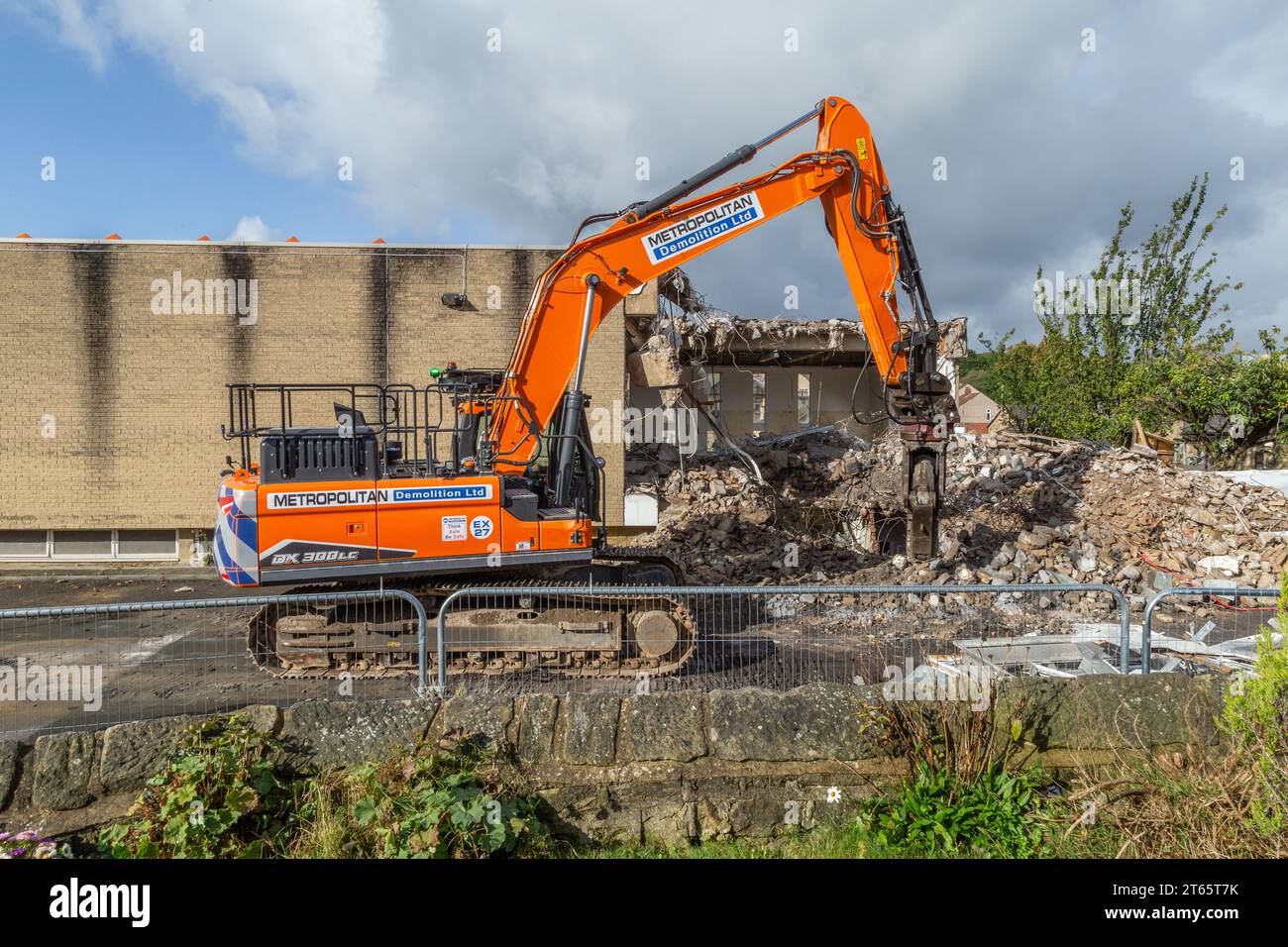The Demolition of Ian Clough Hall and Baildon Library in Baildon, Yorkshire. The council buildings were demolished to be replaced by apartments. Stock Photo