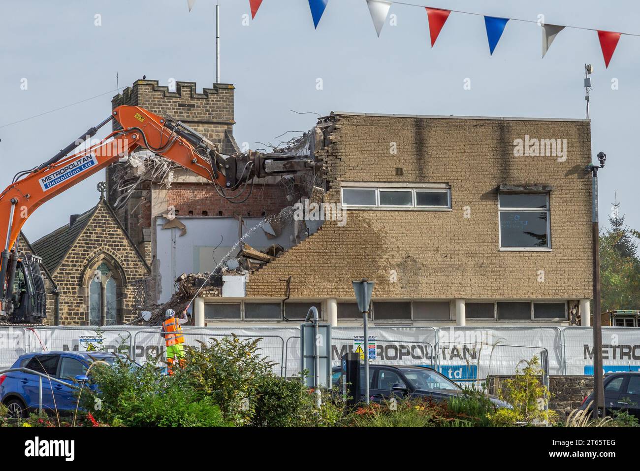 The Demolition of Ian Clough Hall and Baildon Library in Baildon, Yorkshire. The council buildings were demolished to be replaced by apartments. Stock Photo