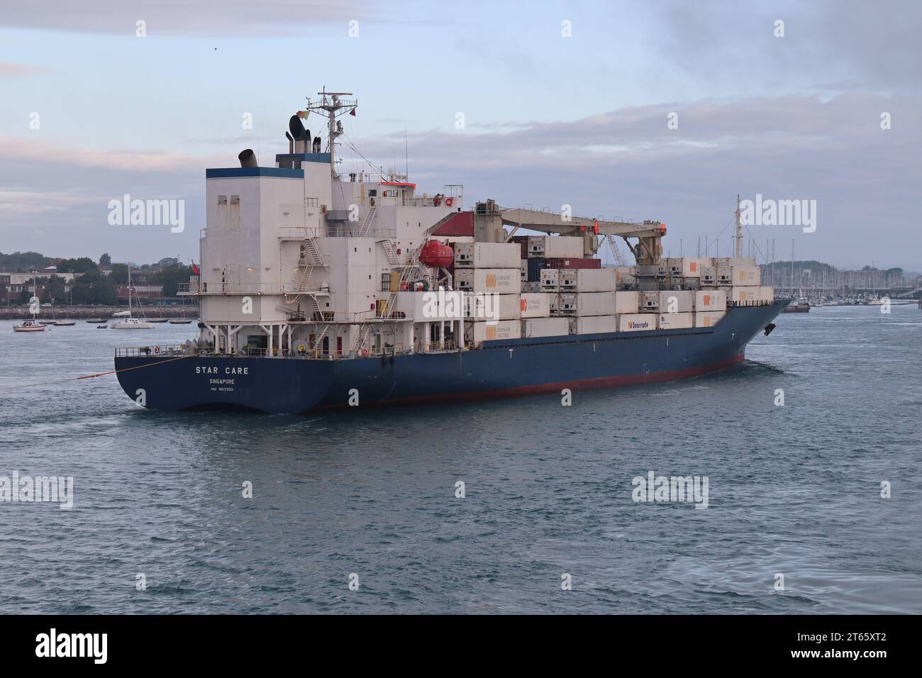 The refrigerated cargo vessel MV STAR CARE making its way to the international port Stock Photo