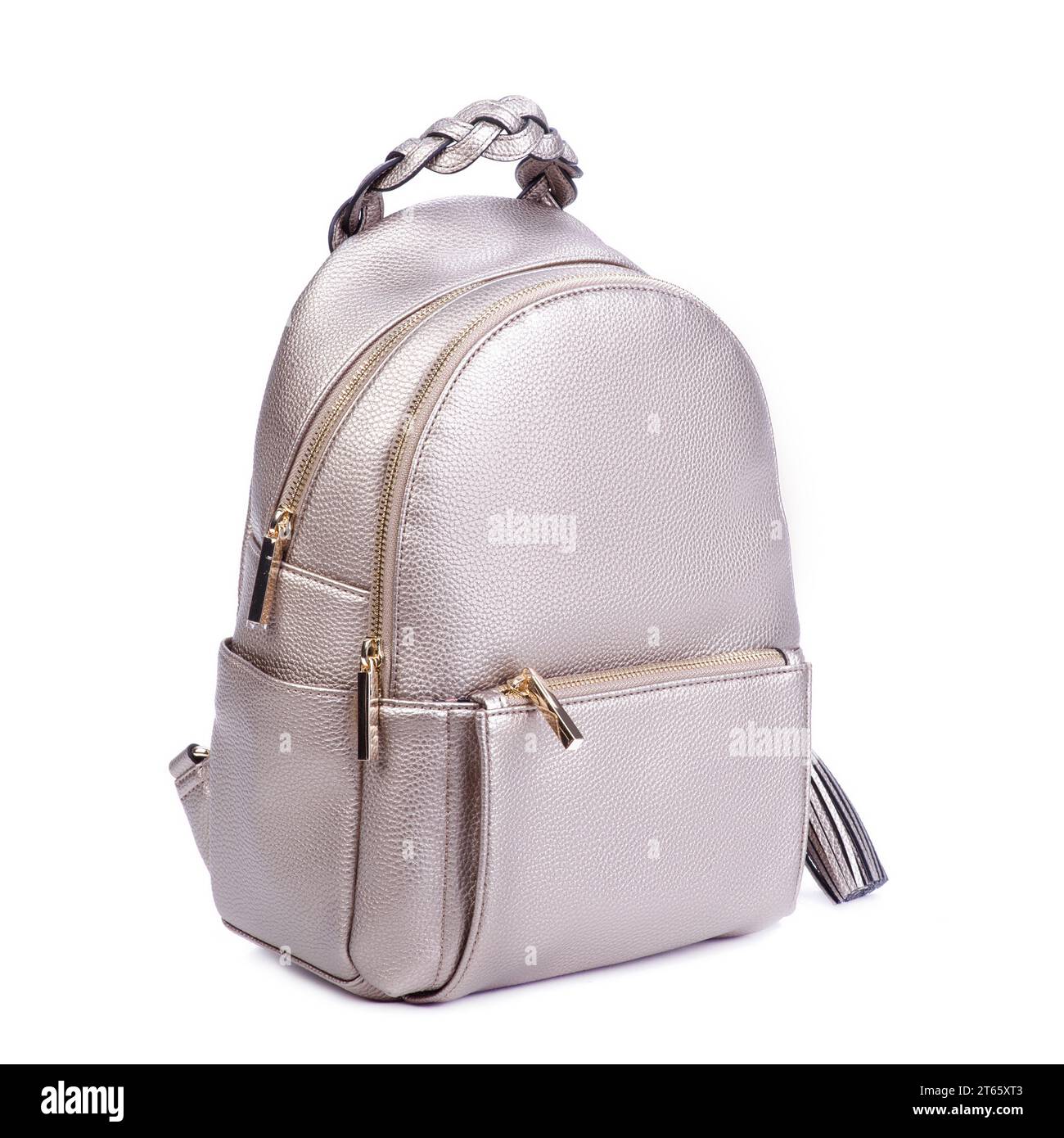 Close-up photo of trendy royal beige leather backpack with two zipped compartments and pocket with an original braided handle isolated on a white back Stock Photo