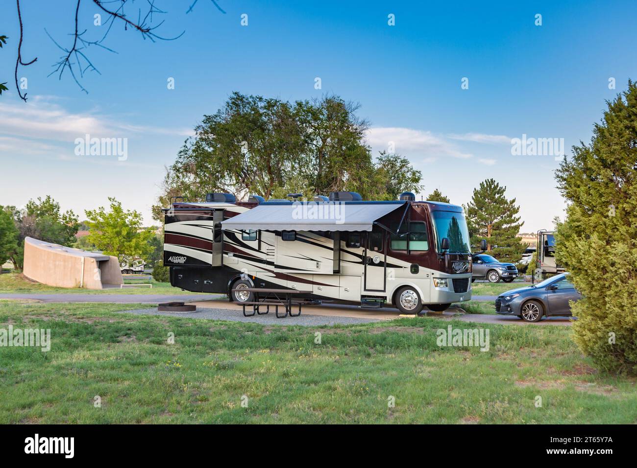 Tiffin Allegro Open Road motorhome parked on leveling blocks at