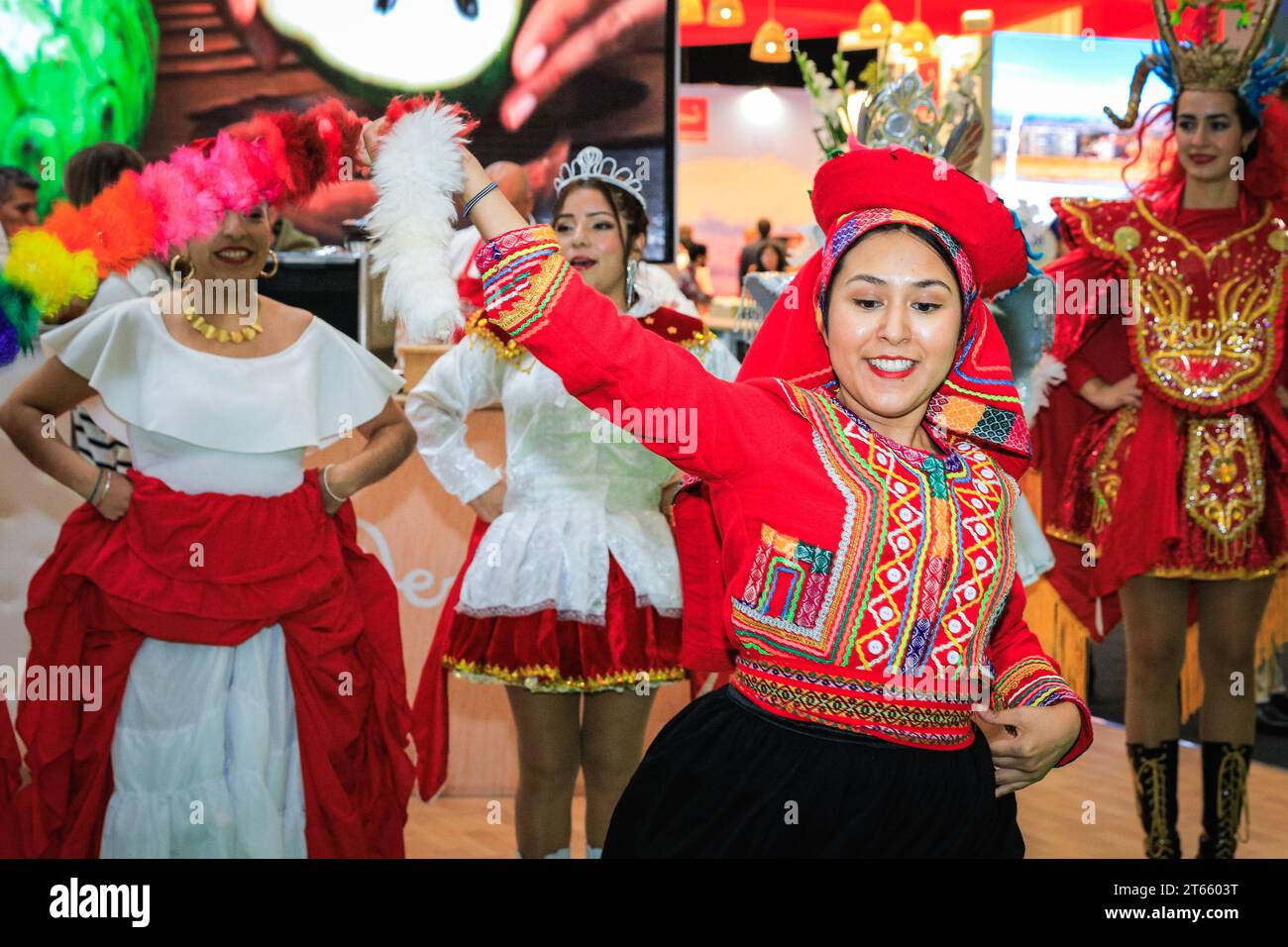 London, UK. 08th Nov, 2023. A final performance from the ArtPerUK dance group in regional costumes, as well as plenty of pisco sours served, mean the Peru booth is popular wih visitors as well as fellow exhibitors in the final hours. As every year, in the last couple of hours on the final day of World Travel Market at ExCel London many country booths and travel show stands hold informal gatherings and wrap parties to celebrate a successful three days of the trade show, often with performances, music, dancing and local food and drinks. Credit: Imageplotter/Alamy Live News Stock Photo