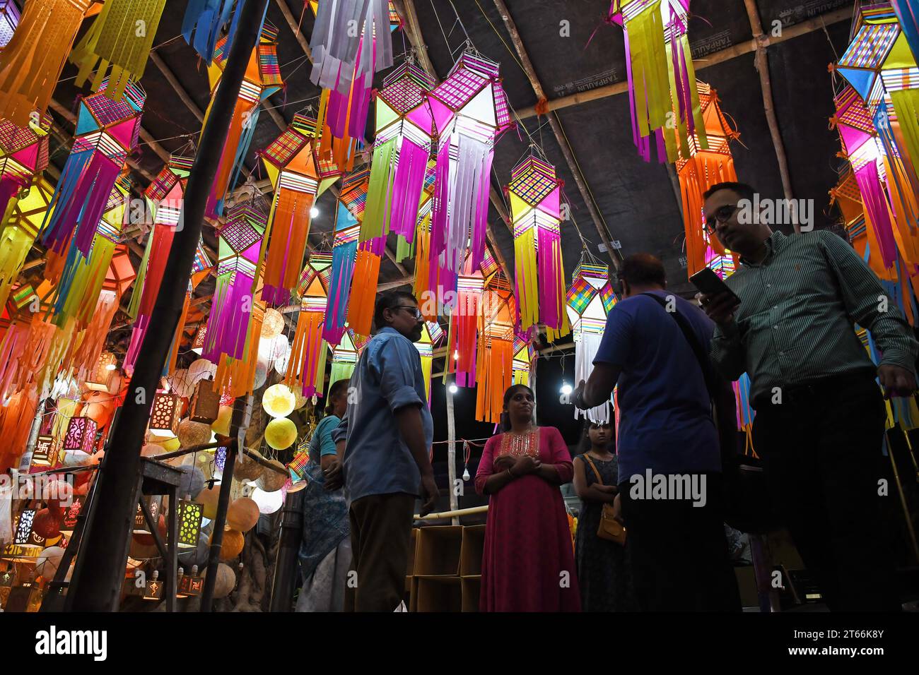 Mumbai, India. 08th Nov, 2023. People shop for lanterns ahead of the Hindu festival of lights, Diwali in Mumbai. Diwali festival is celebrated by Hindus where they shop for lanterns ahead of the festival, clean their home, prepare sweets and snacks, make rangoli (traditional Indian art form where various designs are made on the floor) and light their homes with earthen lamps marking victory of light over darkness. Credit: SOPA Images Limited/Alamy Live News Stock Photo