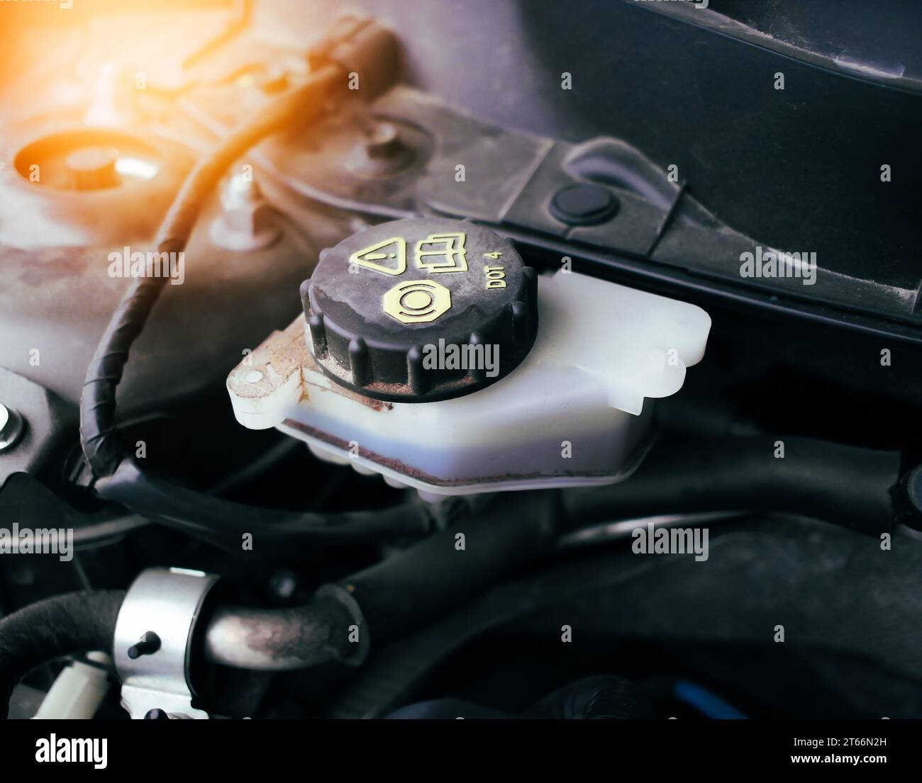 Car brake fluid reservoir for adding brake fluid and maintaining car brake systems , Car maintenance concept Stock Photo