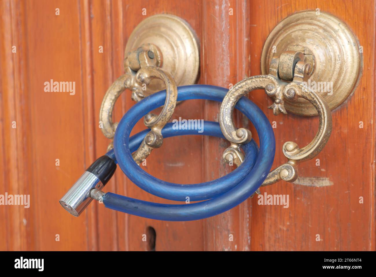Closed old rusty lock on a wooden door Stock Photo - Alamy