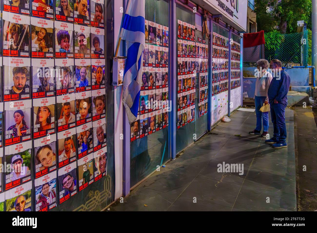 Haifa, Israel - November 07, 2023: The wall of the hostages kidnapped to Gaza, with photos and people reactions. Haifa, Israel Stock Photo