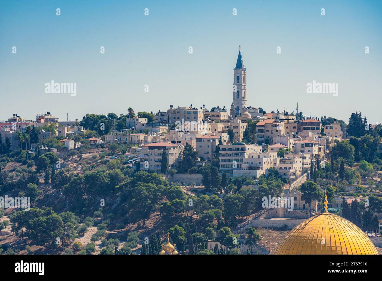 View of the Mount of Olives in Jerusalem with a bell tower on top of it Stock Photo