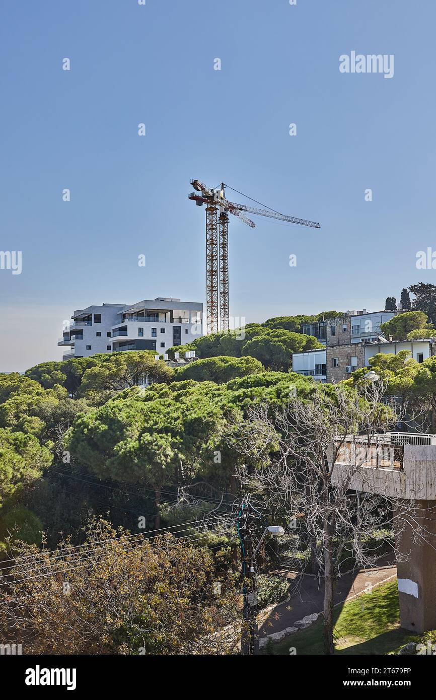 Tall cranes in building area hi-res stock photography and images - Alamy