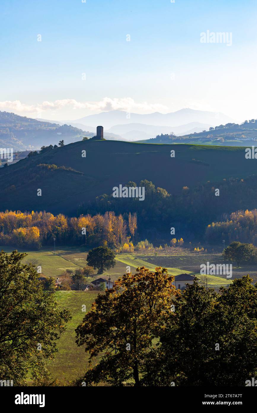 View of an ancient tower on Montefeltro in Italy's Marche region, near Tavoleto, in autumn. Stock Photo