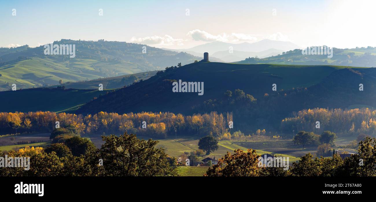 View of an ancient tower on Montefeltro in Italy's Marche region, near Tavoleto, in autumn. Stock Photo