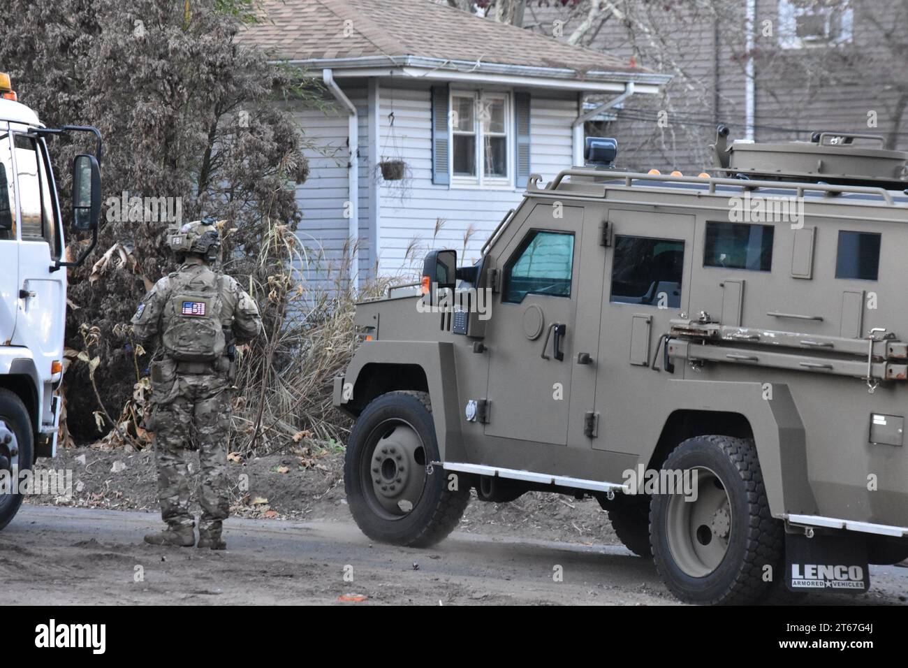 FBI searches a nearby residence for Gregory Yetman with the FBI SWAT
