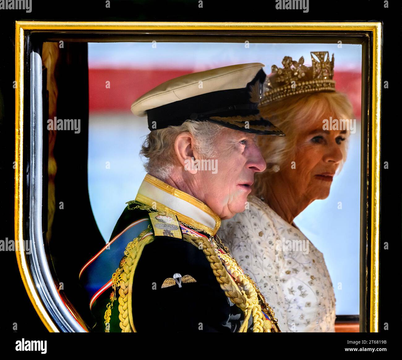 King Charles III and Queen Camilla arriving at Parliament in the Diamond Jubilee State Coach for his first King's Speech at his  first State Opening o Stock Photo