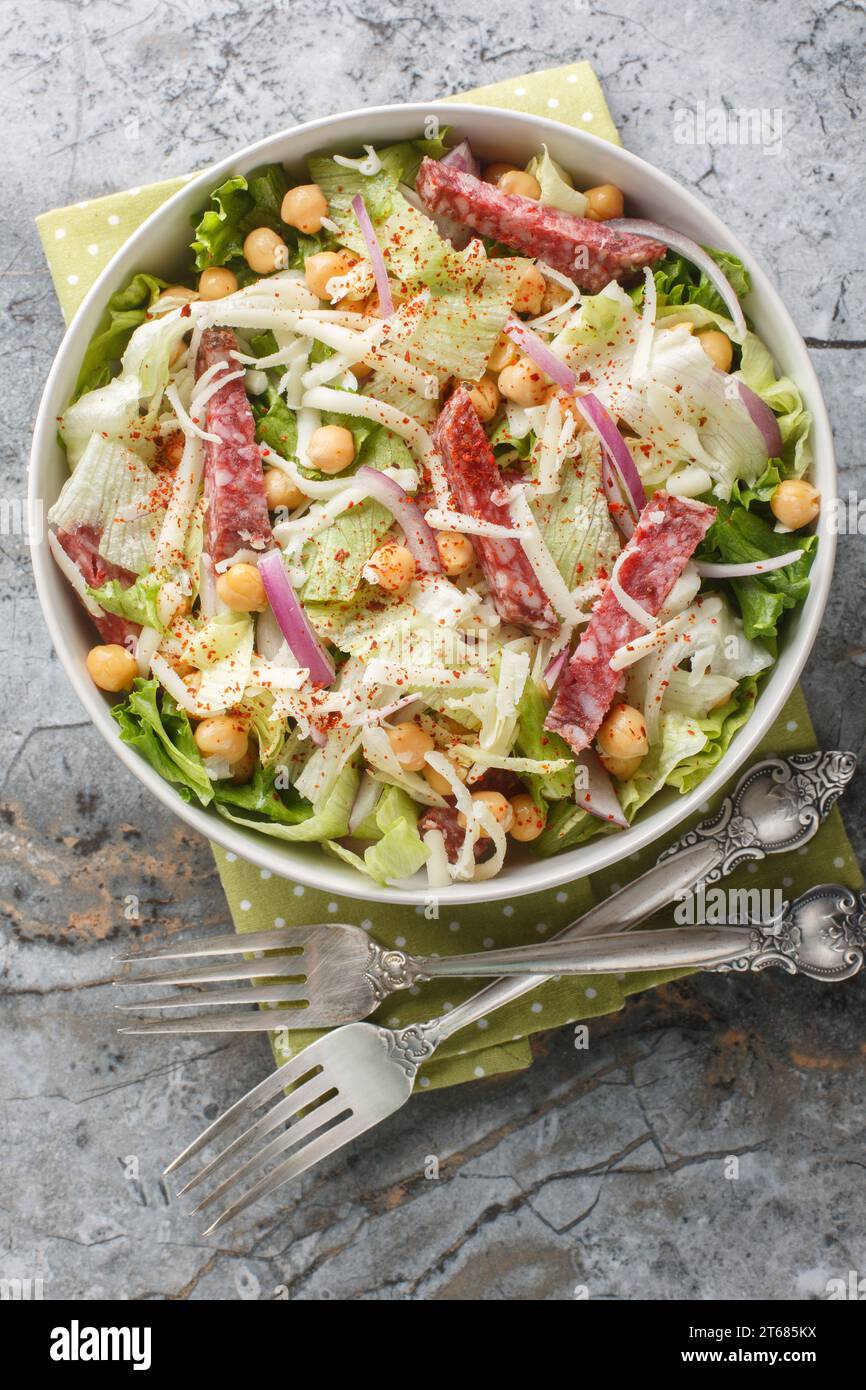 Delicious balanced chickpea salami salad with iceberg and romaine