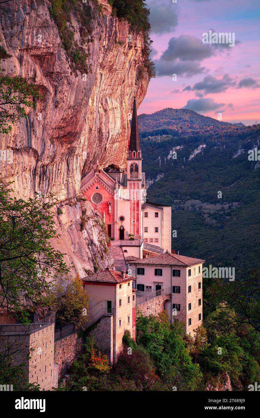 Madonna della Corona, Italy. Aerial image of the unique Sanctuary Madonna della Corona (Sanctuary of the Lady of  the Crown) at autumn sunrise. Stock Photo