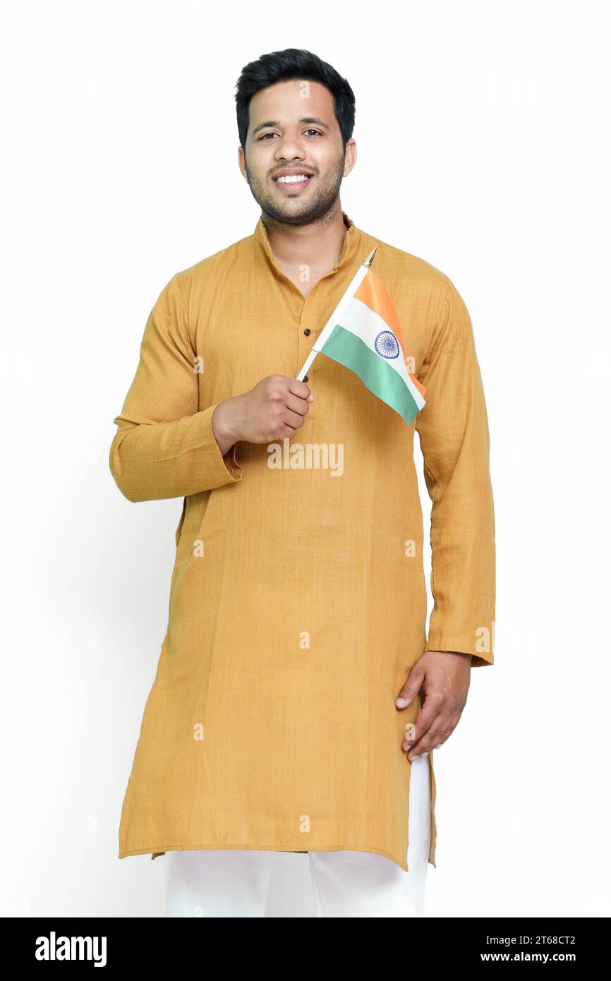 A portrait of a young Indian male wearing a traditional clothing with a ...