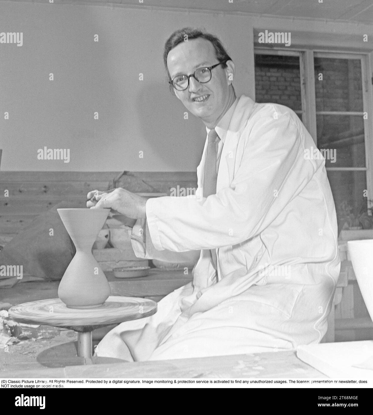 Stig Lindberg (17 August 1916 in Umeå, Sweden – 7 April 1982 in San Felice Circeo, Italy) was a Swedish ceramic designer, glass designer, textile designer, industrial designer, painter, and illustrator.   One of Sweden's most important postwar designers, Lindberg created whimsical studio ceramics and graceful tableware lines during a long career with the Gustavsberg pottery factory. Stig Lindberg studied painting at the University College of Arts, Crafts and Design. In 1937, he went to work at Gustavsberg under Wilhelm Kåge. In 1949, he was named Kåge's successor as art director. From this per Stock Photo