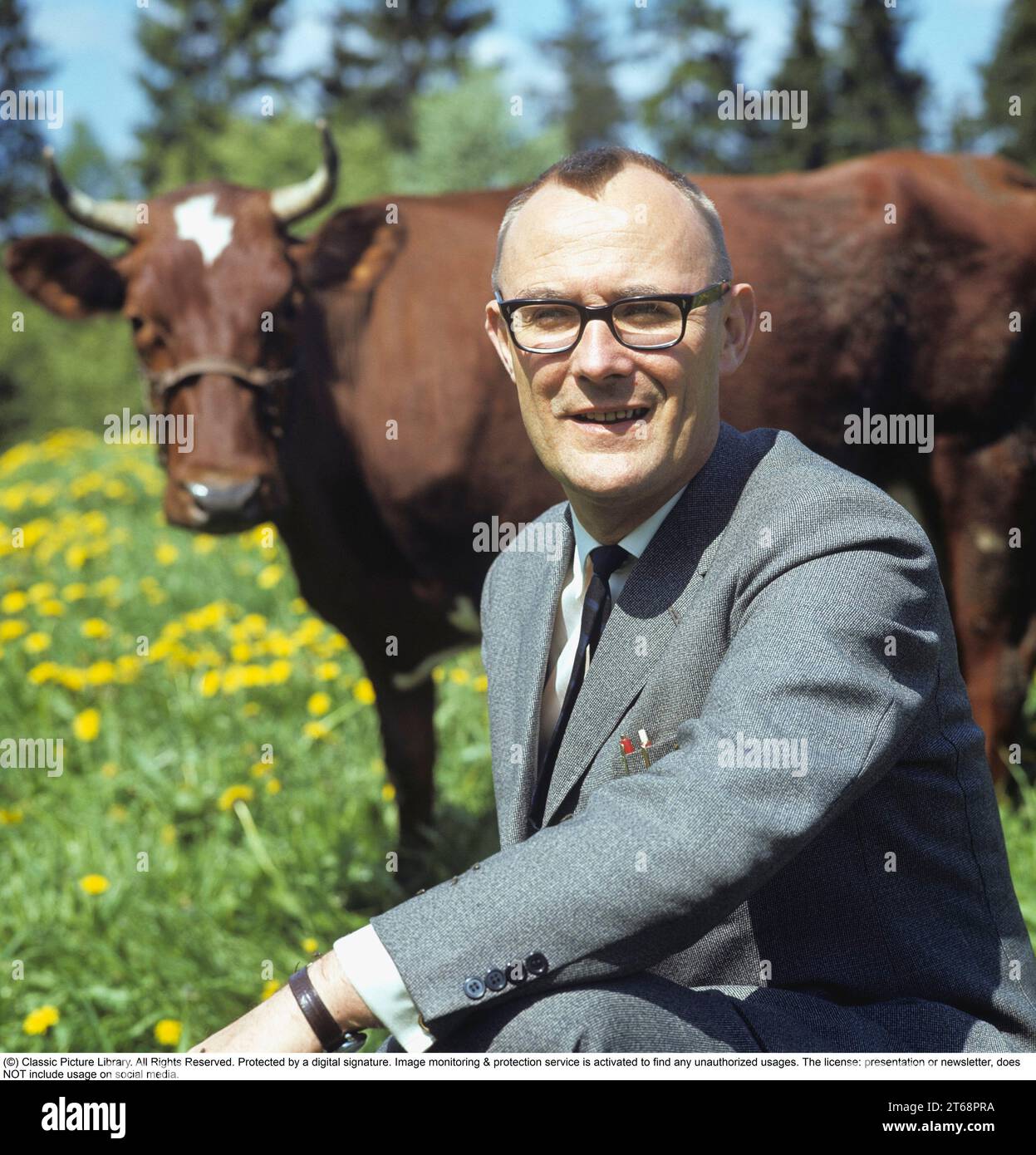 Feodor Ingvar Kamprad. 30 March 1926 – 27 January 2018) was a Swedish billionaire business magnate best known for founding IKEA, a multinational retail company specialising in furniture. Pictured outside his home town of Älmhult Småland Sweden 1968. Roland Palm ref 2-11-4 Stock Photo