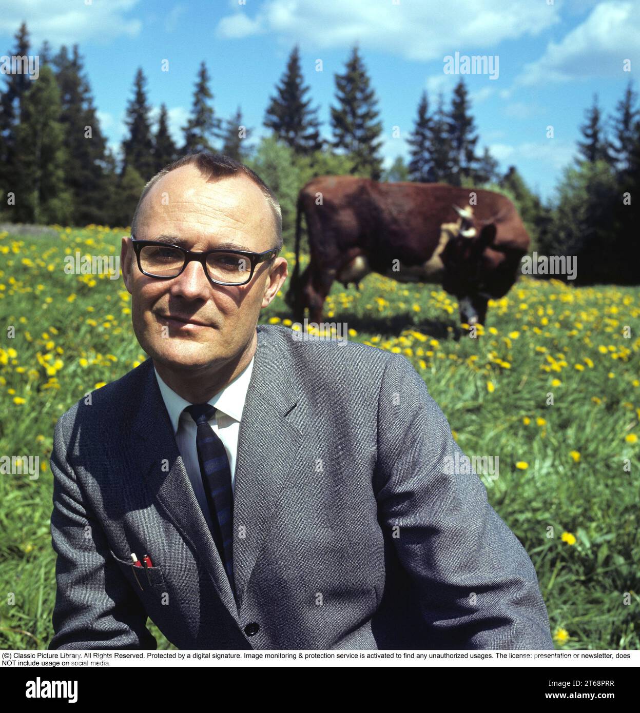 Feodor Ingvar Kamprad. 30 March 1926 – 27 January 2018) was a Swedish billionaire business magnate best known for founding IKEA, a multinational retail company specialising in furniture. Pictured outside his home town of Älmhult Småland Sweden 1968. Roland Palm ref 2-11-8 Stock Photo