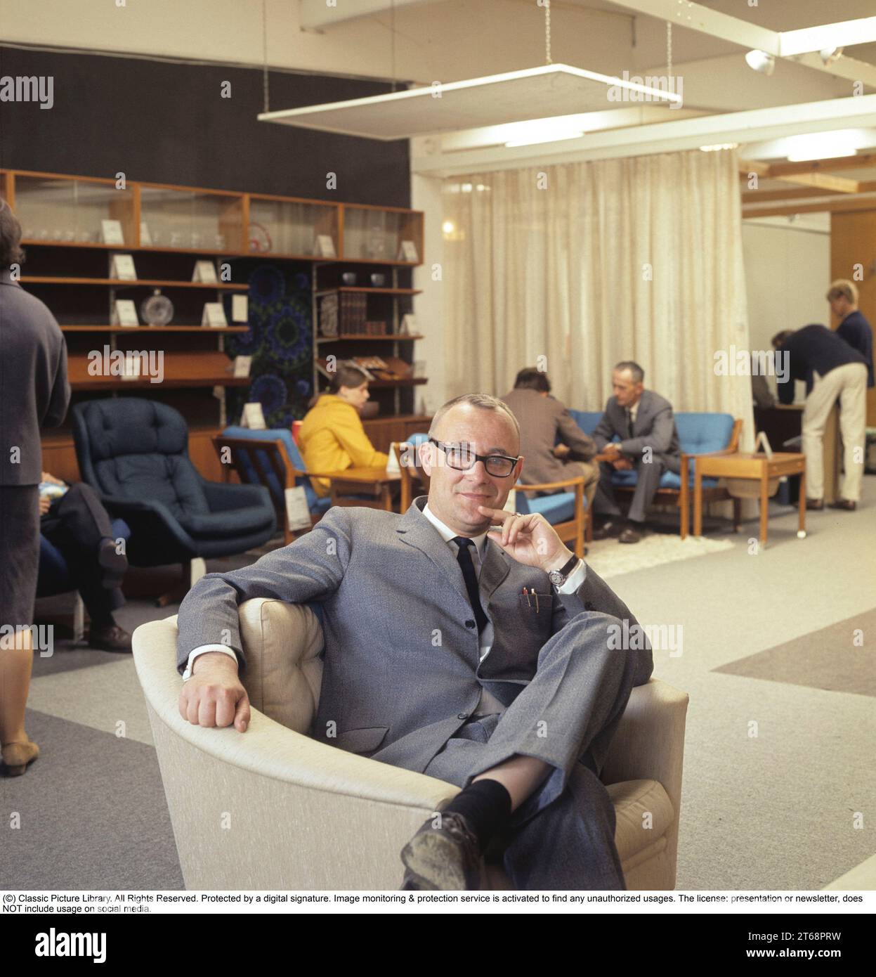Feodor Ingvar Kamprad. 30 March 1926 – 27 January 2018) was a Swedish billionaire business magnate best known for founding IKEA, a multinational retail company specialising in furniture. Pictured in the very first IKEA store he opened  in his home town of Älmhult Småland Sweden 1968. Roland Palm ref 2-11-9 Stock Photo