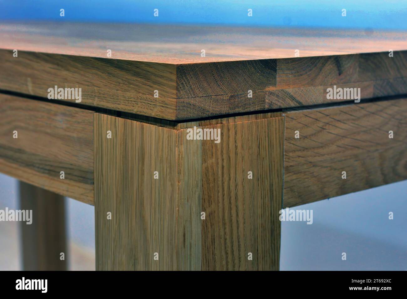 Wooden dinner table surface. Natural wood furniture close view isolated