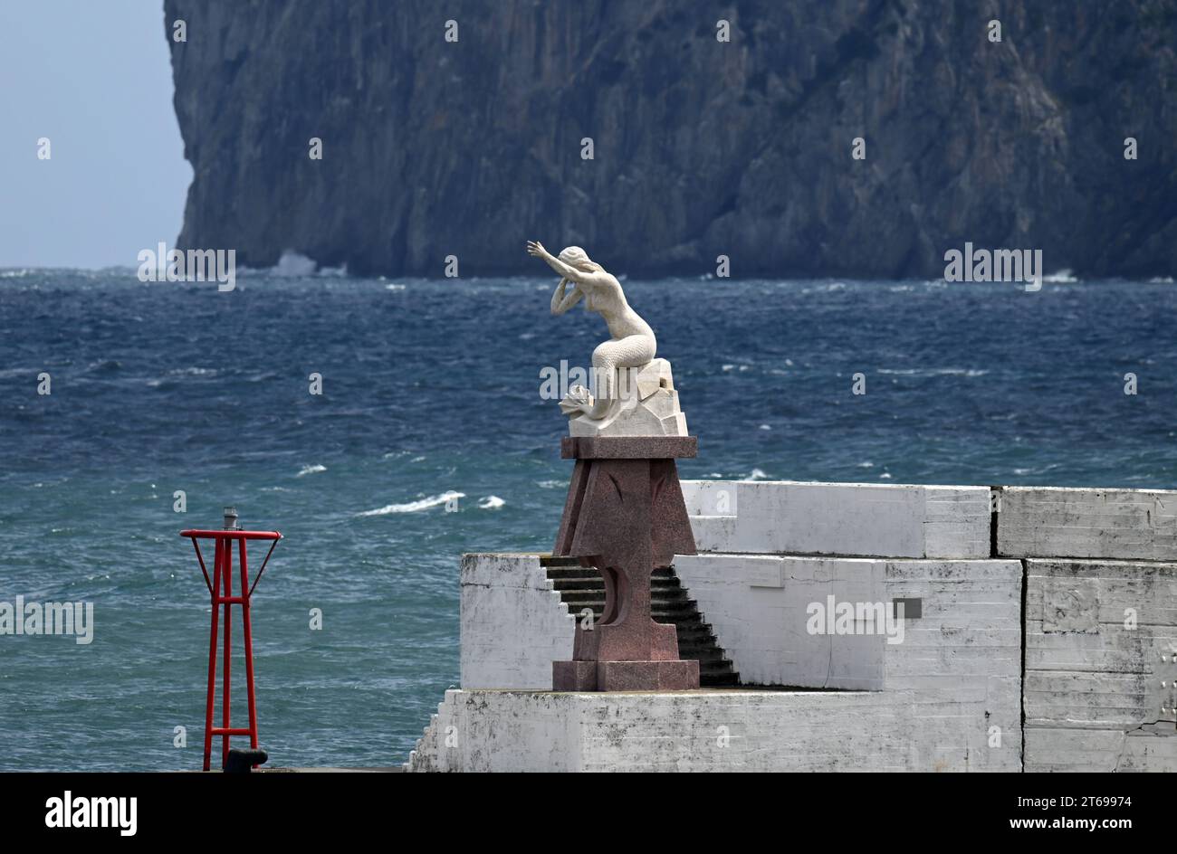 A mermaid at the end of the harbour in Bermeo Stock Photo