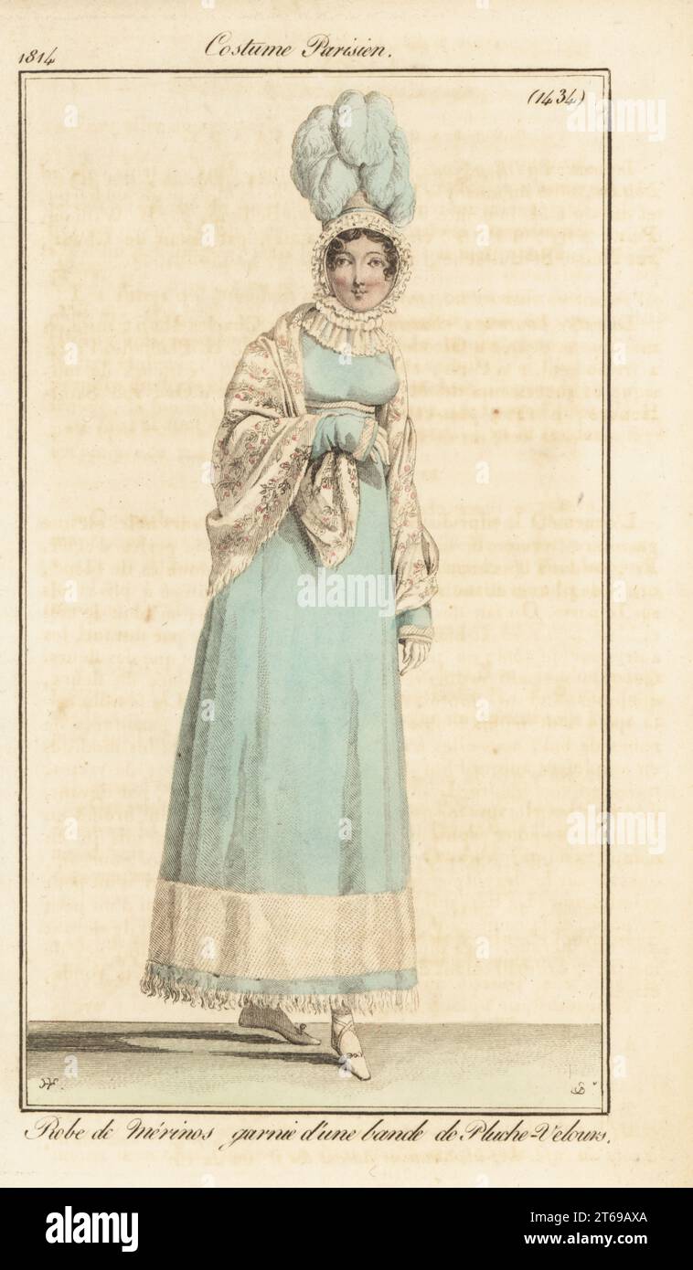 Fashionable woman in plumed bonnet, Merino wool dress decorated with a band of velveteen, embroidered shawl. Robe de merinos garni d'une bande de pluche-velours. Handcoloured copperplate engraving by Jean Charles Baquoy after a fashion plate by Horace Vernet from Pierre de la Mesangeres Journal des Dames et des Modes, Magazine of Women and Fashion, Paris, 1814. Stock Photo