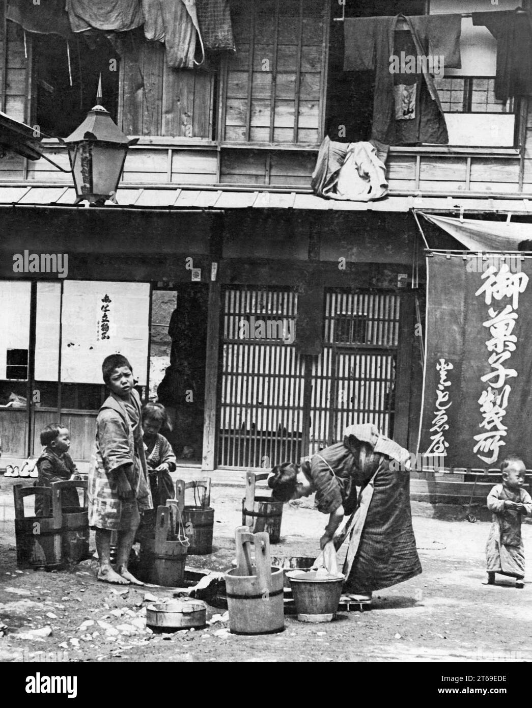 Doing laundry in the backyard of a house in Japan. [automated