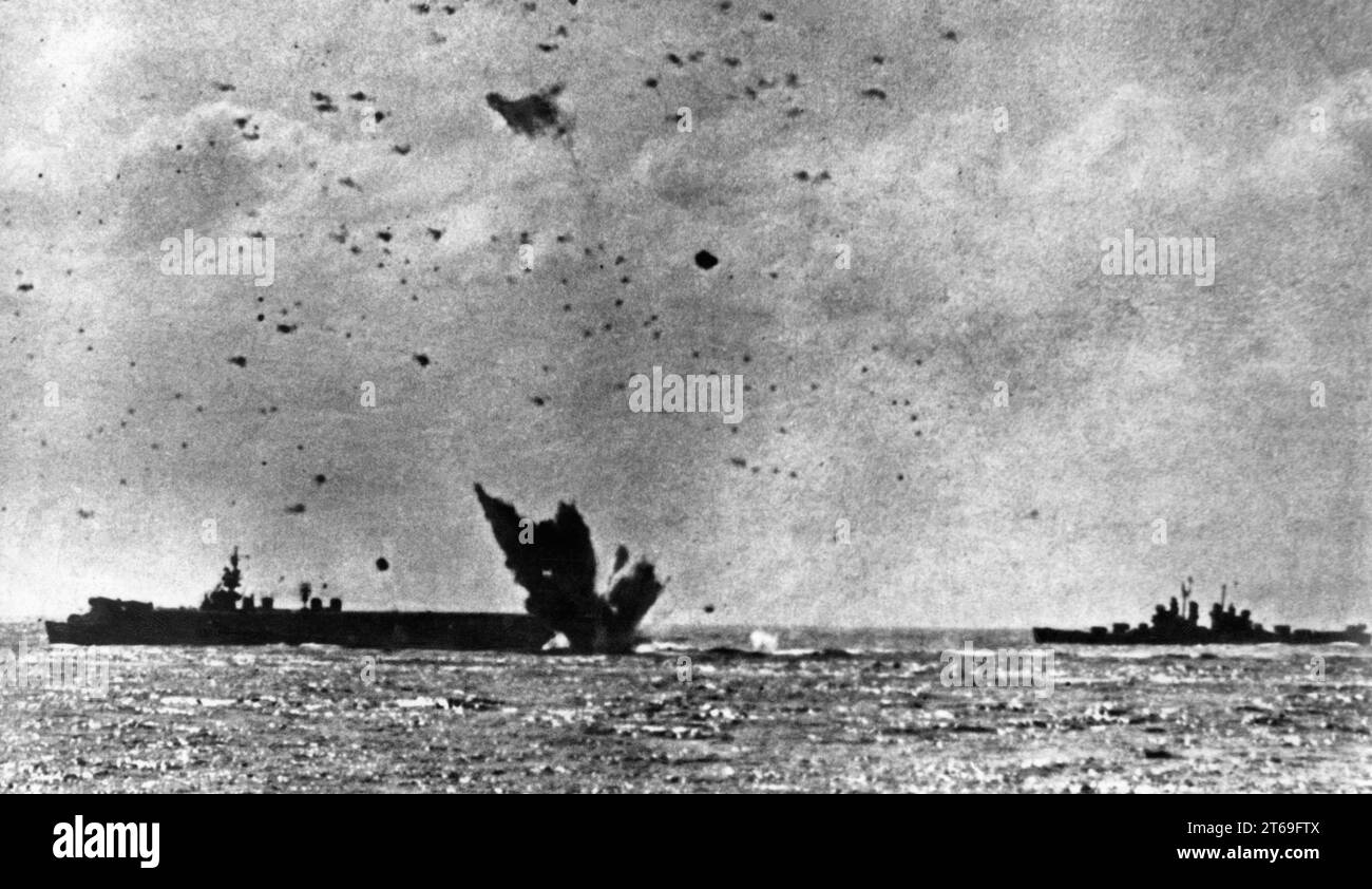 Japanese kamikaze planes attack the American aircraft carrier Intrepit during the Battle of Okinawa. [automated translation] Stock Photo