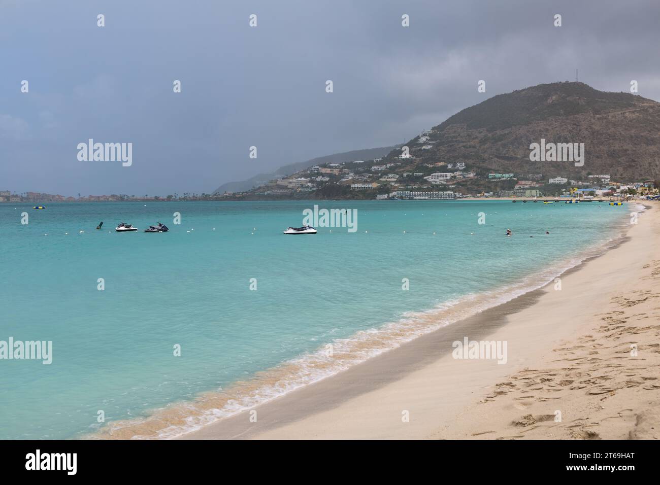 Empty beach on a rainy morning at the port of Phillipsburg, St. Maarten in the Caribbean Stock Photo