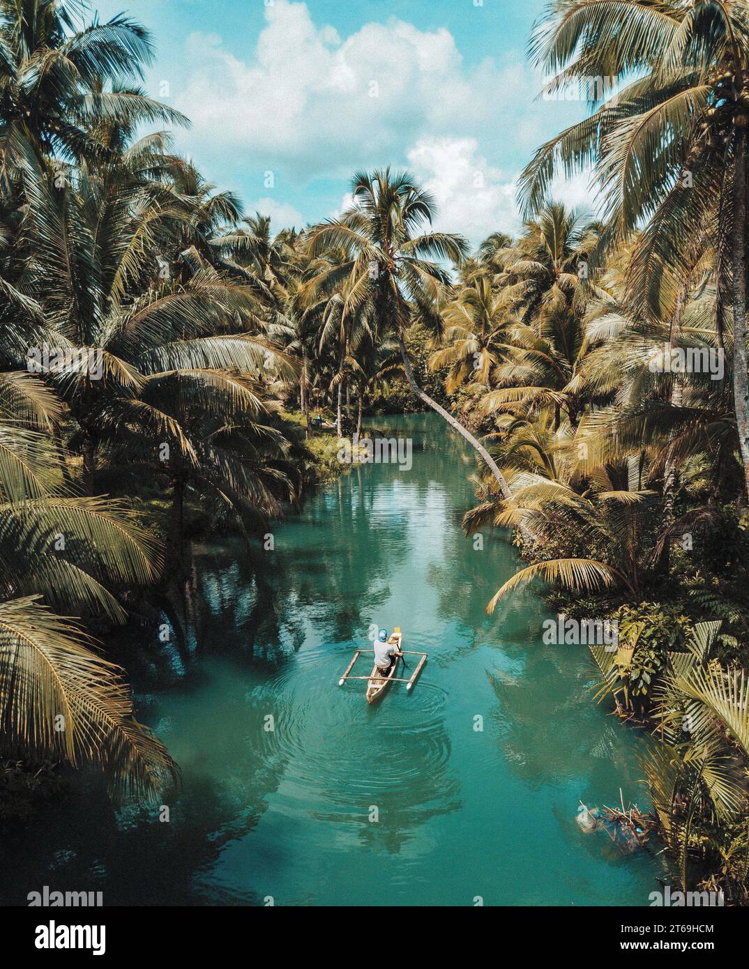 Drone photo of Siargao island, Philippines, paddling on the local boat Stock Photo