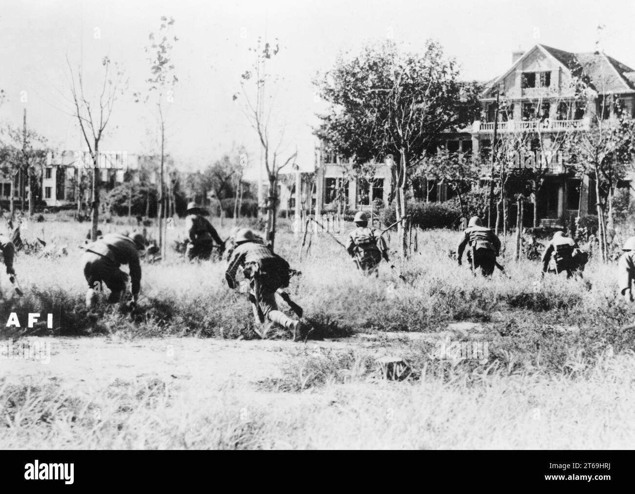 Japanese infantry attacking enemy positions off Sarawak near Kucik on Borneo Island. [automated translation] Stock Photo