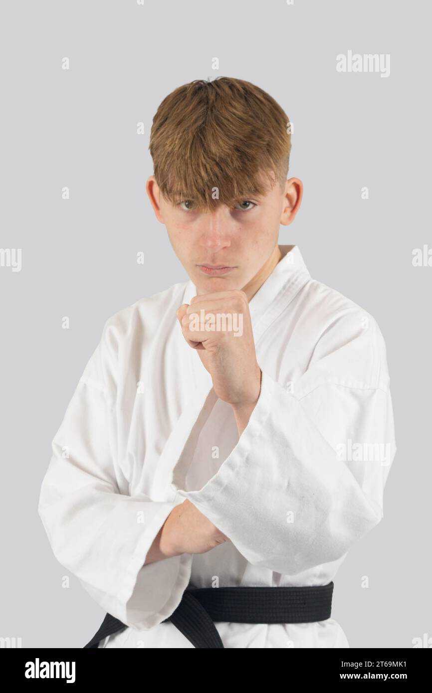 Black belt teenage boy with his guard up Stock Photo