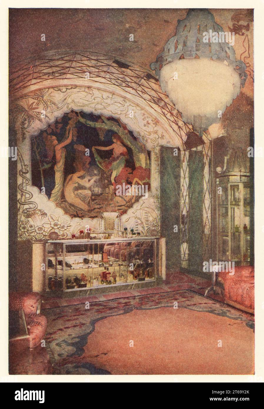 Art Deco interior of the Richard Hudnut shop, rue de la Paix, Paris, 1928. A glass case with perfume bottles under a mural painted by the lacquerist Jean Dunand, pink ceiling and glass chandelier. Smithsonian-process colour print from Richard le Galliennes Romance of Perfume, Hudnut, New York, 1928. Stock Photo
