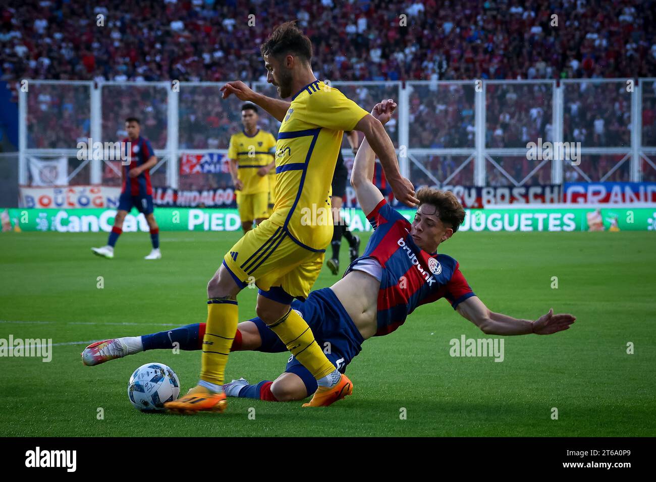 Marcelo Saracchi of Boca Junior (L) and Agustin Giay of San Lorenzo (R) seen in action during the match between San Lorenzo de Almagro and Boja Juniors as part of Copa de la Liga - Fecha 12- Zona B at Estadio Pedro Bidegain. Final Score: San Lorenzo 1 : 1 Boca Juniors. Stock Photo