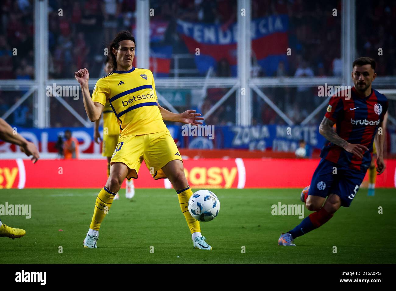 Edison Cavani of Boca Juniors (L) Jalil Elias of San Lorenzo (R) seen in action during the match between San Lorenzo de Almagro and Boja Juniors as part of Copa de la Liga - Fecha 12- Zona B at Estadio Pedro Bidegain. Final Score: San Lorenzo 1 : 1 Boca Juniors. Stock Photo