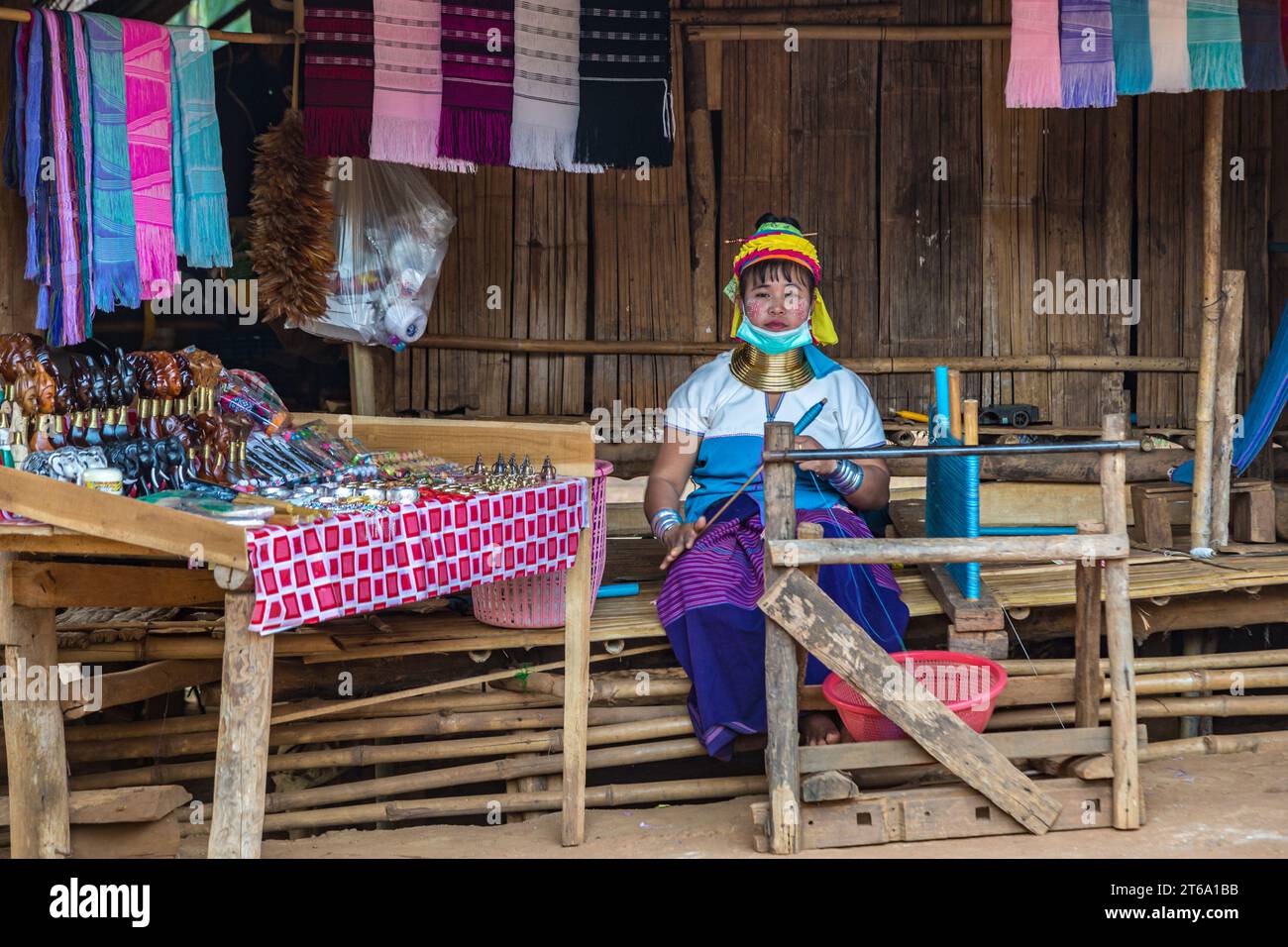 Woman selling scarves and crafts in the Long Neck Karen tribe (Kayah ...