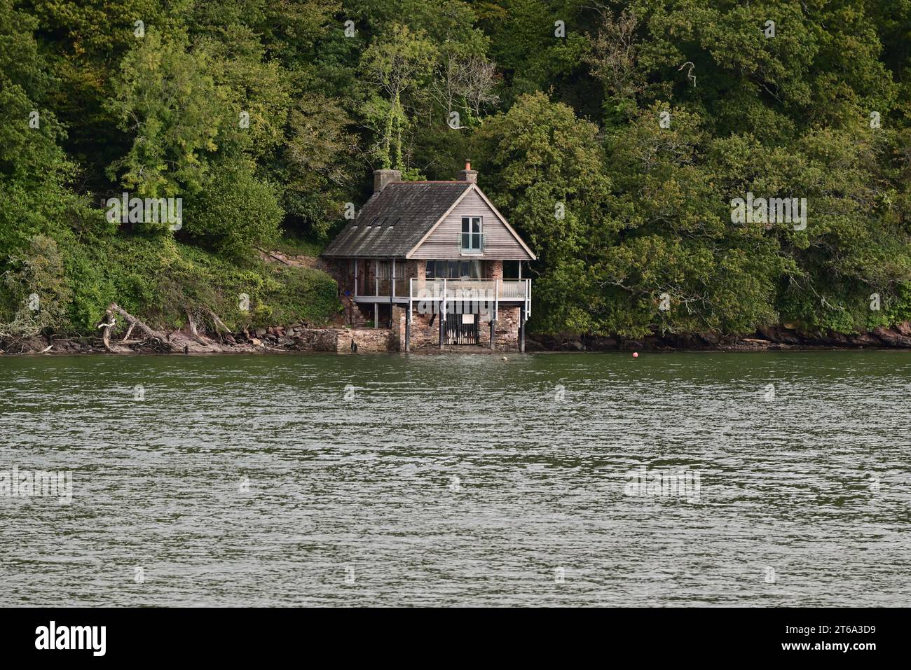 A boat house beside the river Dart in South Devon Stock Photo Alamy
