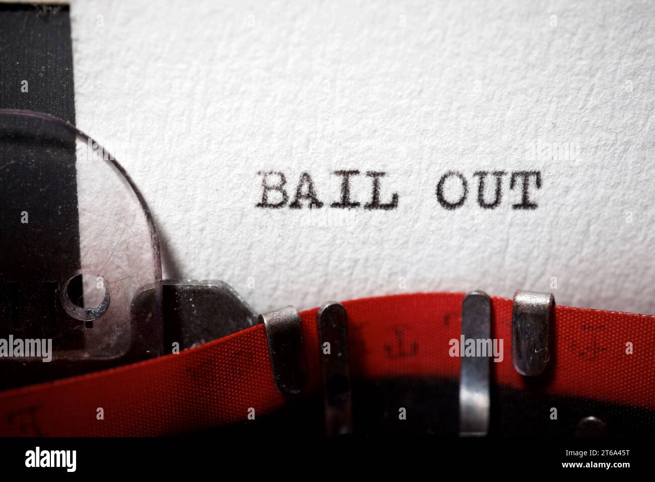 Bail out text written with a typewriter. Stock Photo