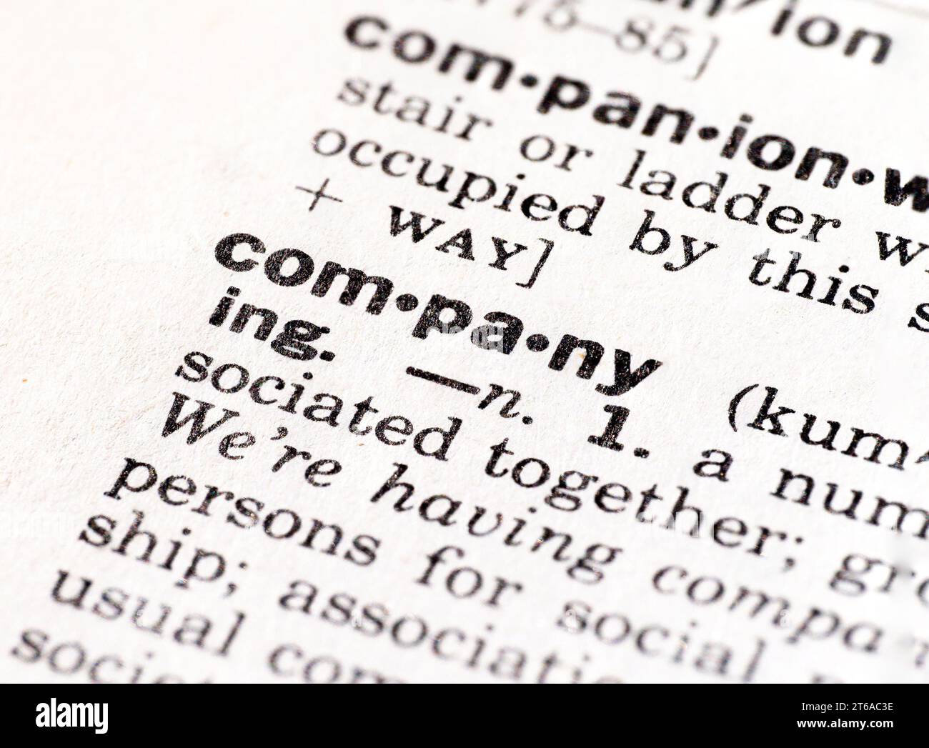 Closeup dictionary definition of the word company Stock Photo Alamy