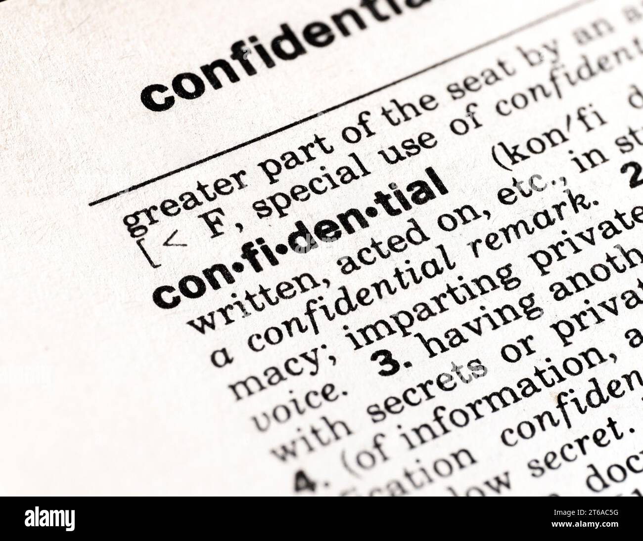 Closeup dictionary definition of the word confidential Stock Photo Alamy