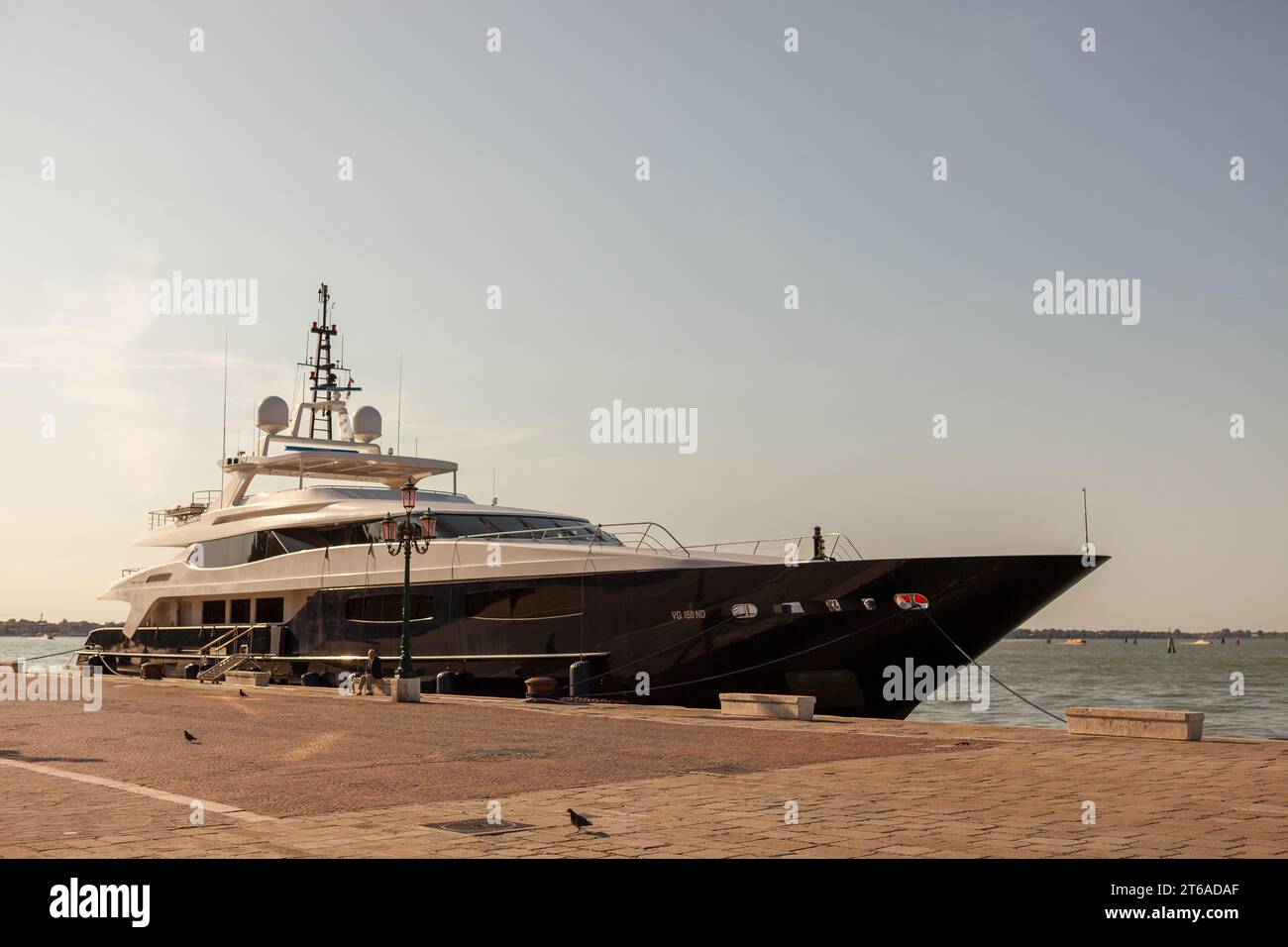 Yatch moored at a quay in Venice, Italy. District of Castello. Stock Photo