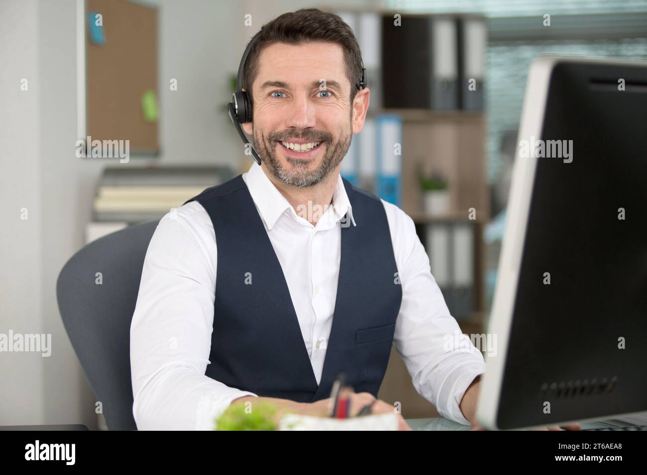 startup businessman smiling at the camera Stock Photo - Alamy