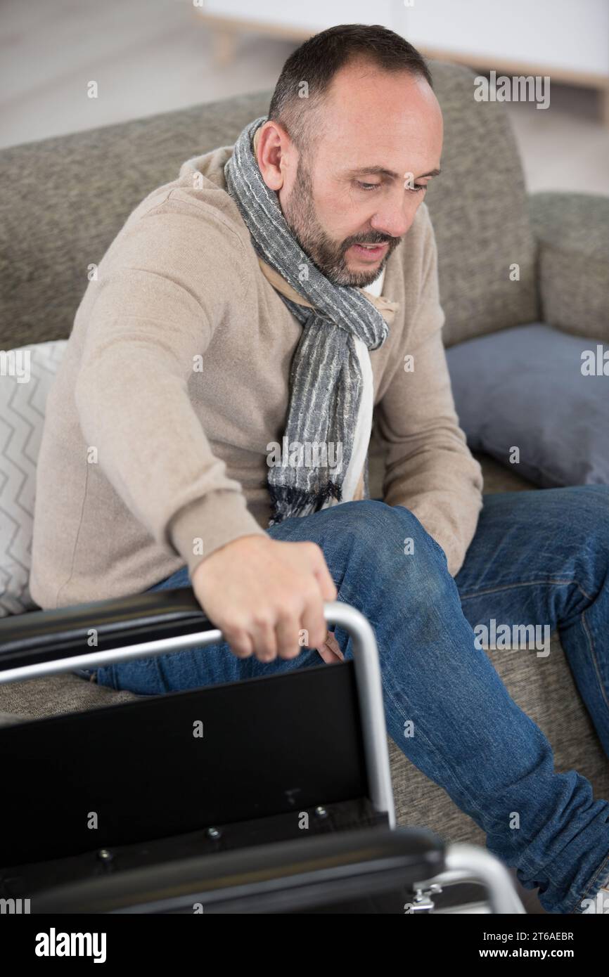 Wheelchair old man thinking hi-res stock photography and images - Alamy