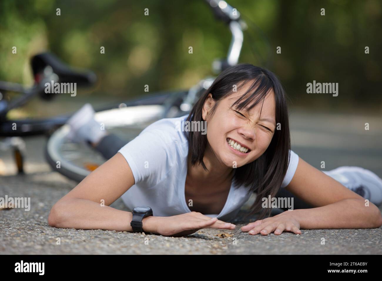 upset woman fell off mountain bike Stock Photo Alamy
