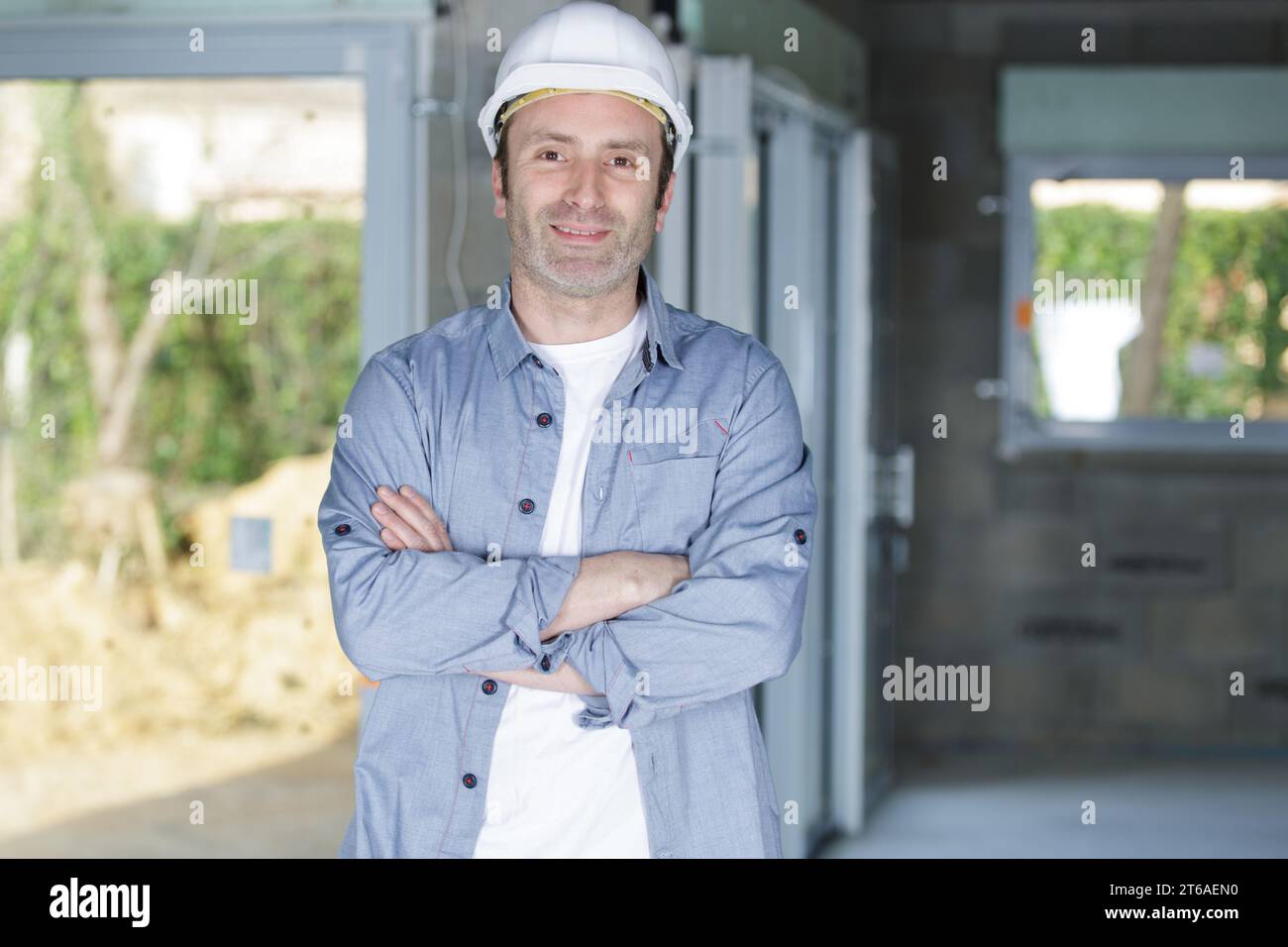 happy man worker on the construction site Stock Photo
