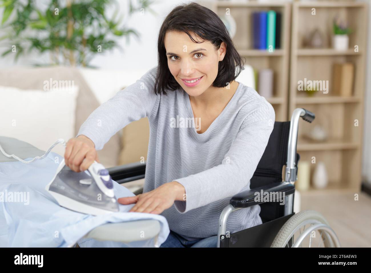 girl-putting-on-clothes-hi-res-stock-photography-and-images-alamy
