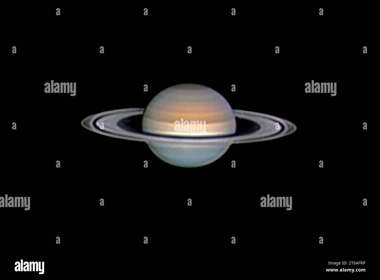 the planet Saturn photographed with an amateur telescope Stock Photo