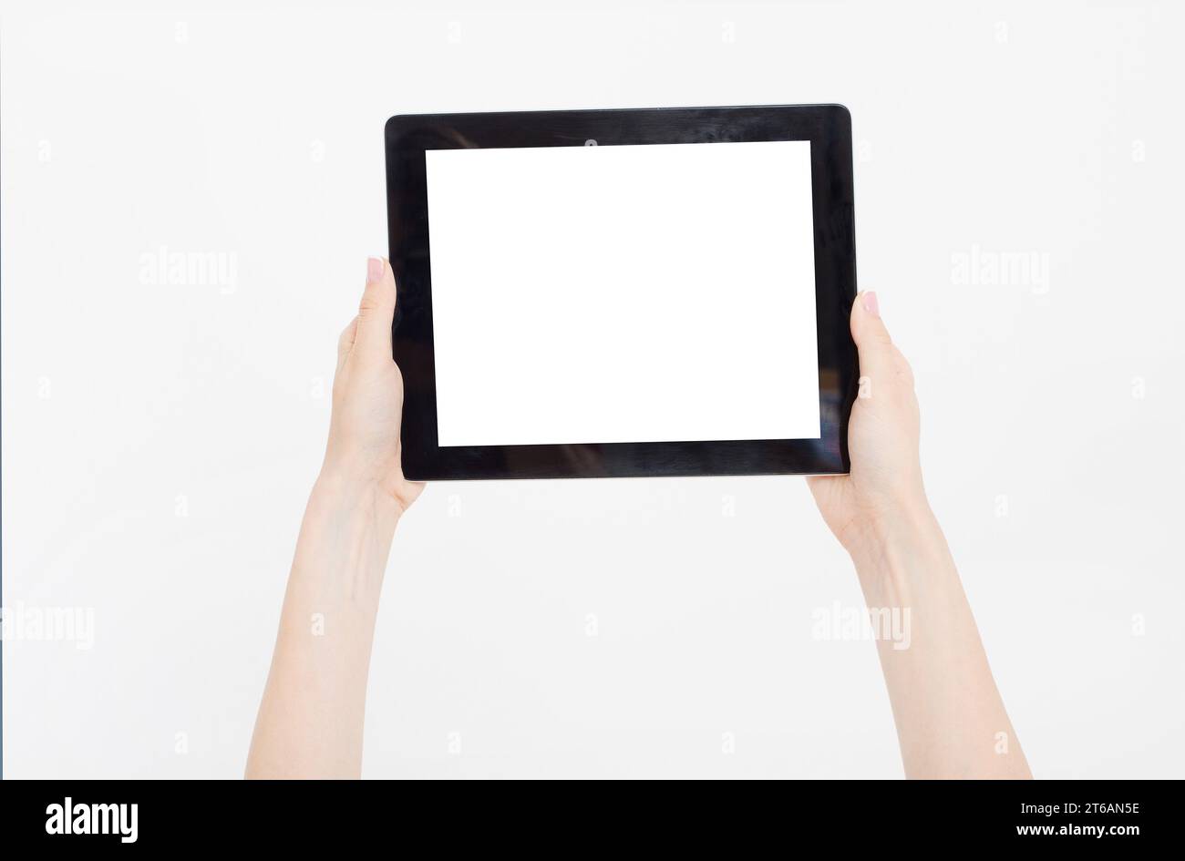 Hand holding black tablet isolated on white clipping path inside. Top ...