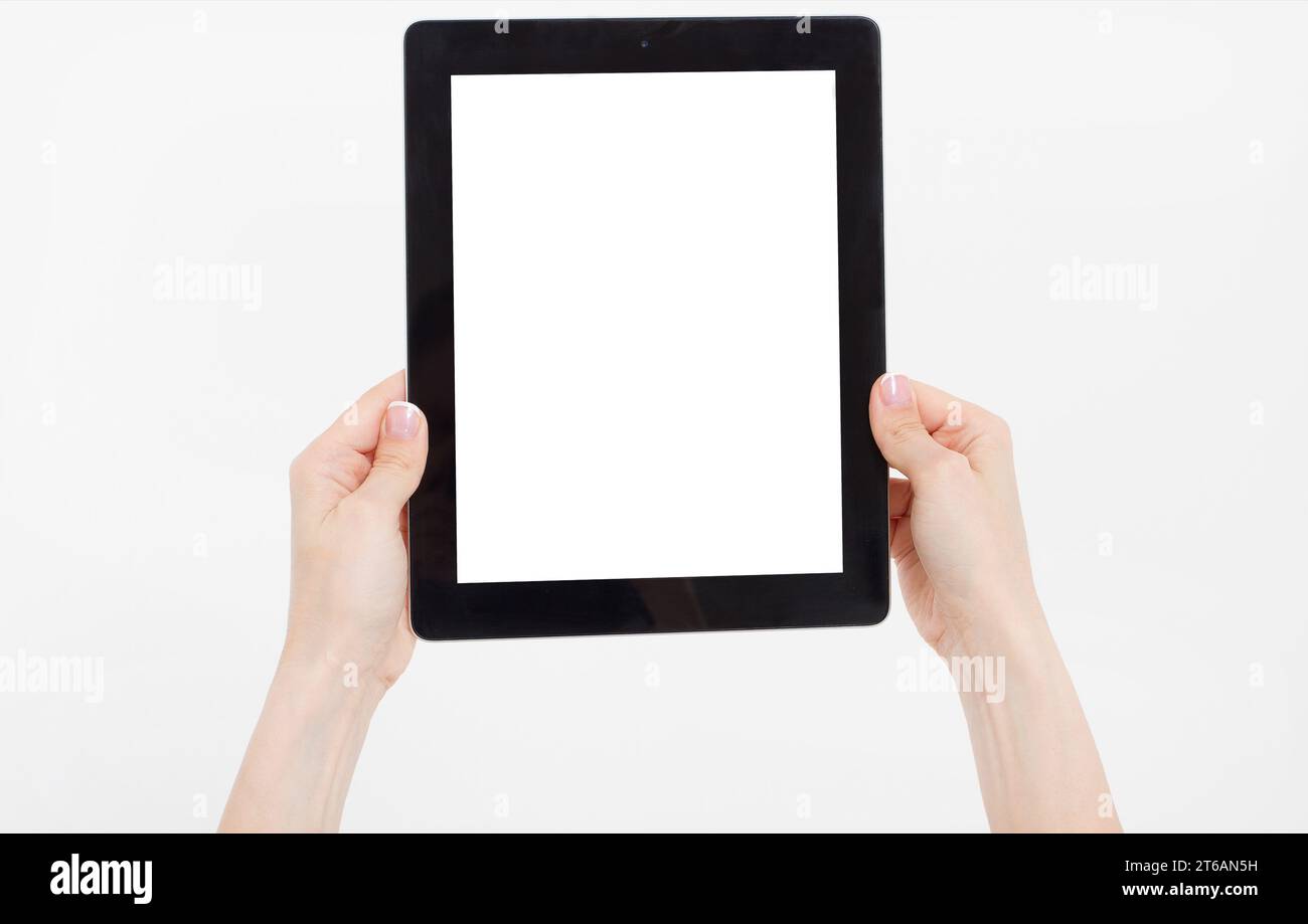 Hand holding black tablet isolated on white clipping path inside. Top ...