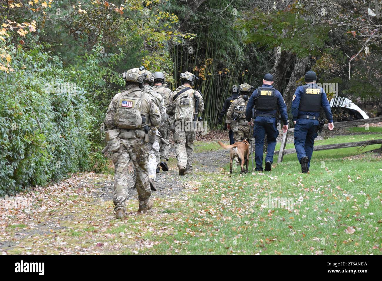 Helmetta, United States. 09th Nov, 2023. FBI agents sweep the property